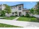 Modern two-story home with landscaping and walkway at 2440 Floyd St, Sarasota, FL 34239