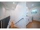 Bright laundry room with white cabinets, washer, and dryer at 2440 Floyd St, Sarasota, FL 34239