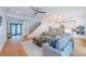Open living area featuring hardwood floors and modern furniture at 2440 Floyd St, Sarasota, FL 34239