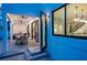 Covered patio features an outdoor dining area and built-in grill at 2440 Floyd St, Sarasota, FL 34239