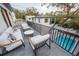 Rooftop patio with outdoor furniture and pool view at 2440 Floyd St, Sarasota, FL 34239
