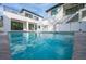 Luxury home with a refreshing blue pool in the backyard at 2440 Floyd St, Sarasota, FL 34239