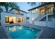 Inviting swimming pool in a beautifully landscaped backyard at 2440 Floyd St, Sarasota, FL 34239