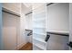 Large walk-in closet with ample shelving and hanging space at 2440 Floyd St, Sarasota, FL 34239