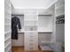 Large walk-in closet with ample shelving and hanging space at 2440 Floyd St, Sarasota, FL 34239