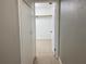 Clean hallway with access to bedrooms and bathroom at 2825 Sequoia Ln, Sarasota, FL 34237