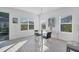 Casual breakfast nook features a glass-top table and chairs at 5415 Limelight Dr, Apollo Beach, FL 33572