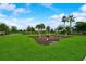 Community outdoor fitness area with various exercise equipment at 5415 Limelight Dr, Apollo Beach, FL 33572