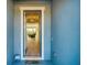 Open front door view into the living room with light floors at 5415 Limelight Dr, Apollo Beach, FL 33572