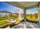 Relaxing screened porch overlooking backyard patio and grassy area at 5415 Limelight Dr, Apollo Beach, FL 33572