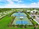 Community tennis and pickleball courts at 5415 Limelight Dr, Apollo Beach, FL 33572