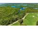 Aerial view of lush golf course and waterways at 7607 Grand Estuary Trl # 205, Bradenton, FL 34212