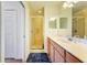 Updated bathroom with double vanity and shower at 7607 Grand Estuary Trl # 205, Bradenton, FL 34212