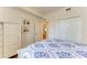 Bright bedroom with a king-size bed and large closet at 7607 Grand Estuary Trl # 205, Bradenton, FL 34212