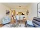 Elegant dining area with modern light fixture at 7607 Grand Estuary Trl # 205, Bradenton, FL 34212