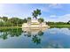 Reflective pond with the community name, Heritage Harbour, on a sign at 7607 Grand Estuary Trl # 205, Bradenton, FL 34212