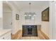 Modern kitchen island with granite top and wine rack at 7607 Grand Estuary Trl # 205, Bradenton, FL 34212