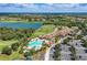 Resort-style pool, clubhouse, and tennis courts at 7607 Grand Estuary Trl # 205, Bradenton, FL 34212