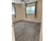 Bedroom with gray floors and ceiling fan at 3375 8Th St, Sarasota, FL 34237
