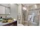 Modern bathroom with glass shower and updated vanity at 770 S Palm Ave # 603, Sarasota, FL 34236