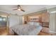 Main bedroom with built-in storage and hardwood floors at 770 S Palm Ave # 603, Sarasota, FL 34236