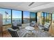 Spacious living room with stunning water views at 770 S Palm Ave # 603, Sarasota, FL 34236