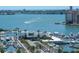 Aerial view of a marina with boats and a building at 770 S Palm Ave # 603, Sarasota, FL 34236