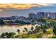 Night view of waterfront cityscape and marina at 770 S Palm Ave # 603, Sarasota, FL 34236