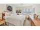 Spacious bedroom with king-size bed and ample closet space at 1750 Benjamin Franklin Dr # 2G, Sarasota, FL 34236