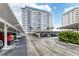 Parking garage with covered parking spaces for residents at 1750 Benjamin Franklin Dr # 2G, Sarasota, FL 34236