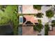 Aerial view of community, showcasing homes with solar panels and pools at 5901 Mariposa Ln, Sarasota, FL 34238