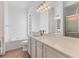 Bathroom with double vanity, soaking tub, and shower at 5901 Mariposa Ln, Sarasota, FL 34238