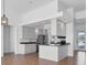Modern kitchen featuring granite countertops and stainless steel appliances at 5901 Mariposa Ln, Sarasota, FL 34238