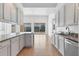 Spacious kitchen featuring granite countertops and modern cabinetry at 5901 Mariposa Ln, Sarasota, FL 34238