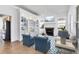 Living room with built-in shelving and fireplace at 5901 Mariposa Ln, Sarasota, FL 34238