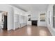 Living room featuring fireplace and built-in shelving at 5901 Mariposa Ln, Sarasota, FL 34238