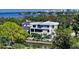 Waterfront property with expansive views and lush landscaping at 1610 N Lodge Dr, Sarasota, FL 34239