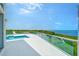 Rooftop pool and spa with stunning views of the surrounding landscape and ocean at 5444 Gulf Of Mexico Dr, Longboat Key, FL 34228