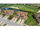 Luxury homes with tile roofs near a golf course at 5830 Wake Forest Run # 104, Bradenton, FL 34211