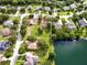 Property location shown from above, near a lake at 623 147Th E St, Bradenton, FL 34212