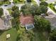 Aerial view of single-Gathering home with pool and lush landscaping at 623 147Th E St, Bradenton, FL 34212