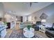 Living room with comfortable seating, a coffee table, and hardwood floors at 8930 Tuscany Isles Dr, Punta Gorda, FL 33950