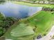 Golf course with lake and driving range at 7112 Marsh View Ter, Bradenton, FL 34212
