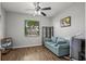 Bright bedroom with wood floors and a ceiling fan at 7112 Marsh View Ter, Bradenton, FL 34212