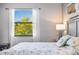 Bedroom with a queen bed and calming decor at 7112 Marsh View Ter, Bradenton, FL 34212