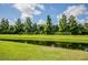 Serene view of a canal with lush green landscape at 7112 Marsh View Ter, Bradenton, FL 34212