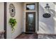 Front door with decorative glass and sidelights at 7112 Marsh View Ter, Bradenton, FL 34212