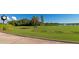 Landscaped putting green with water feature at 7112 Marsh View Ter, Bradenton, FL 34212