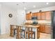 Kitchen boasts granite countertops and stainless steel appliances at 7112 Marsh View Ter, Bradenton, FL 34212
