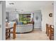 Spacious living room with large sectional sofa and view to backyard at 7112 Marsh View Ter, Bradenton, FL 34212
